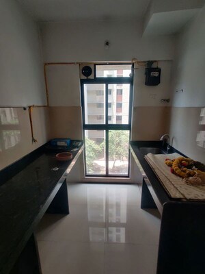 Kitchen in 1 BHK Apartment at Lodha Palava City Lakeshore Greens, Dombivli East – for Rent