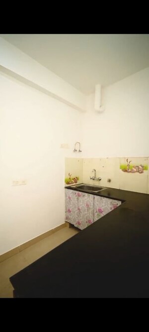 Kitchen in 2 BHK Apartment at Meenal Balmukund Residency, Raj Nagar Extension – for Sale