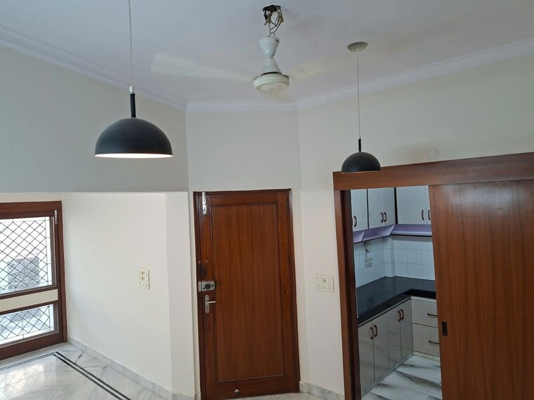 Kitchen, uday park 3 Bedroom 217 Sq.Yd. Builder Floor In Uday Park Delhi 10702885
