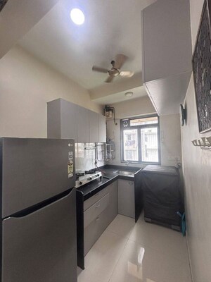 Kitchen in 3 BHK Apartment at Lokhandwala Breeze Apartments, Andheri West – for Rent