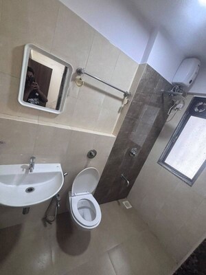 Bathroom in 3 BHK Apartment at Lokhandwala Breeze Apartments, Andheri West – for Rent