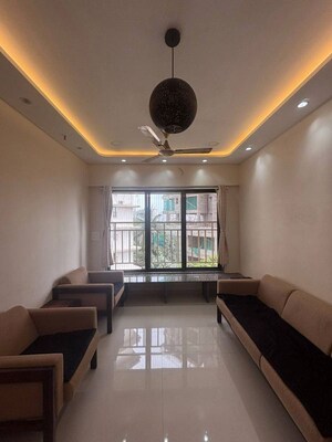 Living Room in 3 BHK Apartment at Lokhandwala Breeze Apartments, Andheri West – for Rent