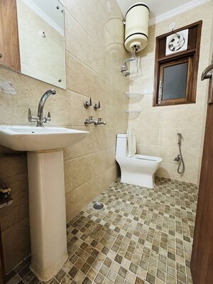 Bathroom in 1 BHK Apartment at Palm Residency Chhatarpur, Chattarpur – for Rent
