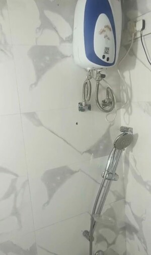 Bathroom in 2 BHK Apartment at Hubtown Palmrose A, Andheri East – for Rent