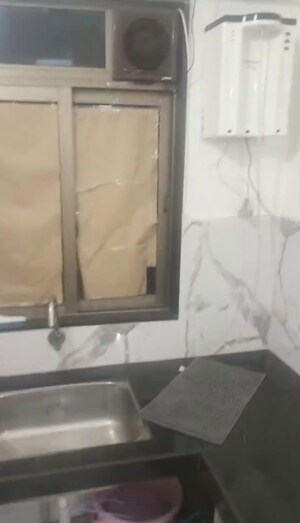 Bathroom in 2 BHK Apartment at Hubtown Palmrose A, Andheri East – for Rent