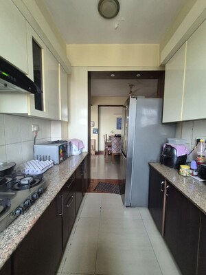 Kitchen in 2 BHK Apartment at Supertech Icon, Ahinsa Khand 2 – for Sale