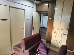 Living Room in 2 BHK Apartment at Dahisar Spring Field CHS, Dahisar West – for Rent