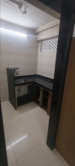 Kitchen in 1 RK Apartment at Saptarishi Towers, Kandivali West – for Rent