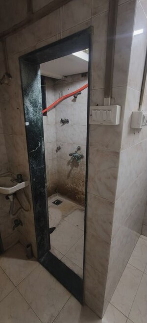 Bathroom in 1 RK Apartment at Saptarishi Towers, Kandivali West – for Rent