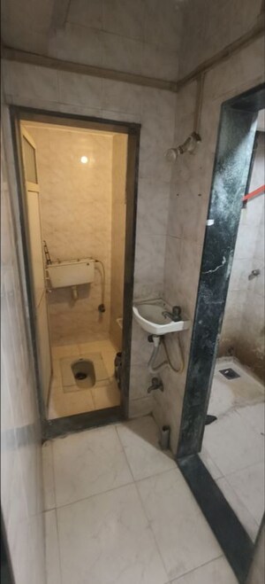 Bathroom in 1 RK Apartment at Saptarishi Towers, Kandivali West – for Rent