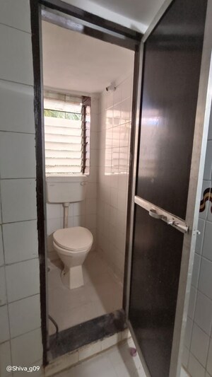 Bathroom in 1 BHK Apartment at Adarsh Nagar Society, Worli – for Rent