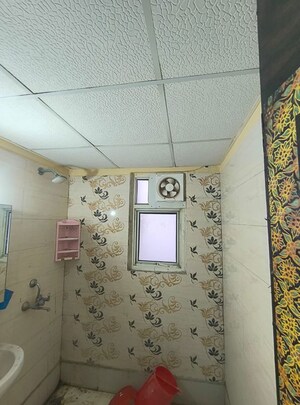 Bathroom in 2 BHK Apartment at Nilaya Greens, Raj Nagar Extension – for Rent
