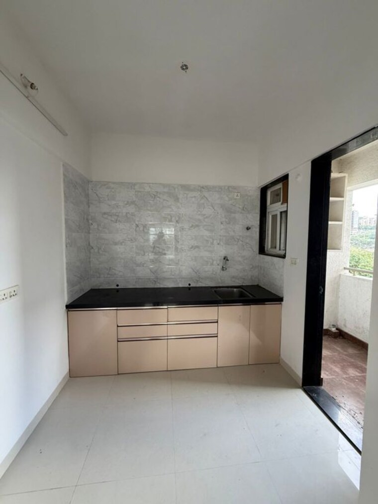 Kitchen, saniket-sunwinds 2 Bedroom 800 Sq.Ft. Apartment In Bavdhan Pune 10703363