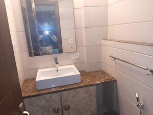 Bathroom in 3 BHK Builder Floor at Defence Colony – for Rent