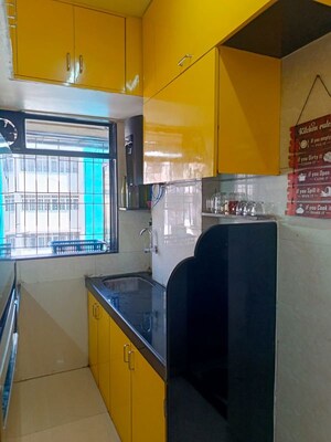Kitchen in 1 BHK Apartment at Ashwa Coral Villa, Goregaon East – for Sale