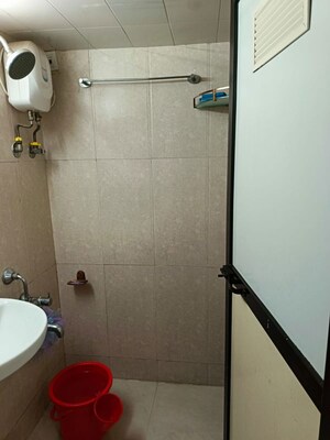 Bathroom in 1 BHK Apartment at Ashwa Coral Villa, Goregaon East – for Sale