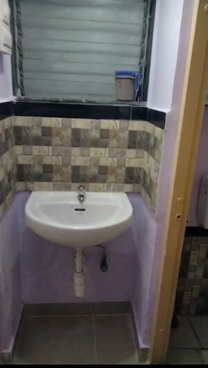 Bathroom in 1 BHK Apartment at Abhinav Naigaon CHS, Dadar East – for Rent
