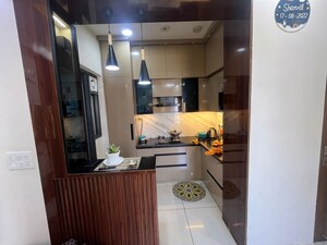 Kitchen in 3 BHK Apartment at JKG Palm Court, Sector 16c Greater Noida – for Sale