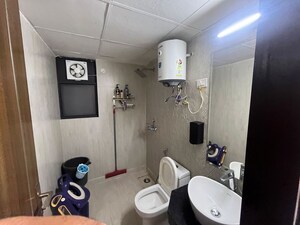 Bathroom in 3 BHK Apartment at JKG Palm Court, Sector 16c Greater Noida – for Sale