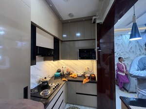Kitchen in 3 BHK Apartment at JKG Palm Court, Sector 16c Greater Noida – for Sale