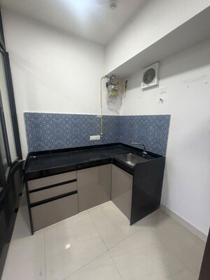 Kitchen in 1 BHK Apartment at Lodha Crown Quality Homes, Majiwada – for Rent