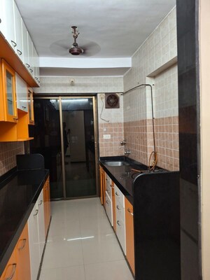 Kitchen in 2 BHK Apartment at Jaydeep Park, Majiwada – for Sale