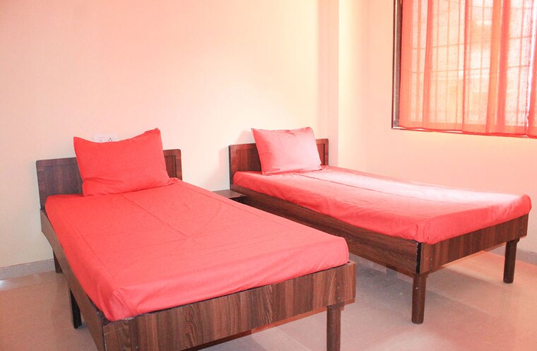 Bedroom, globe-heights Pg For Boys In Goregaon East 10703821
