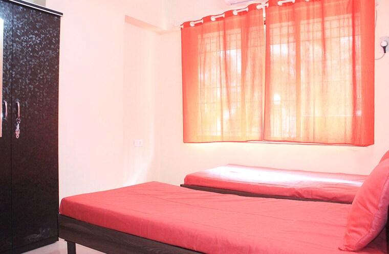 Bedroom, globe-heights Pg For Boys In Goregaon East 10703821