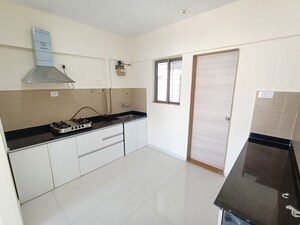 Kitchen in 3 BHK Apartment at Tulsi Shakuntala Kanade Nagar, Undri – for Rent