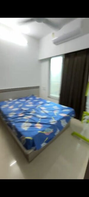 Bedroom in 1 BHK Apartment at Dimple 19 North, Kandivali West – for Rent