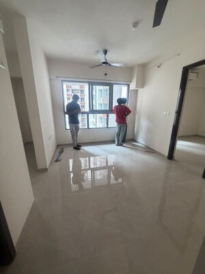 Living Room in 1 BHK Apartment at Piramal Vaikunth, Balkum Pada – for Rent