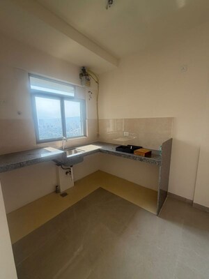 Living Room in 1 BHK Apartment at Piramal Vaikunth, Balkum Pada – for Rent