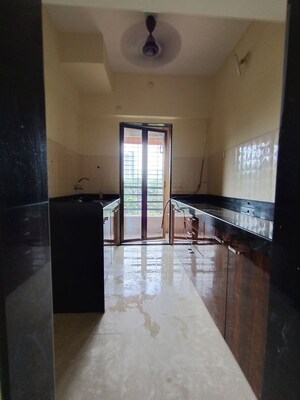Kitchen in 3 BHK Apartment at Hubtown Greenwoods, Vartak Nagar – for Rent