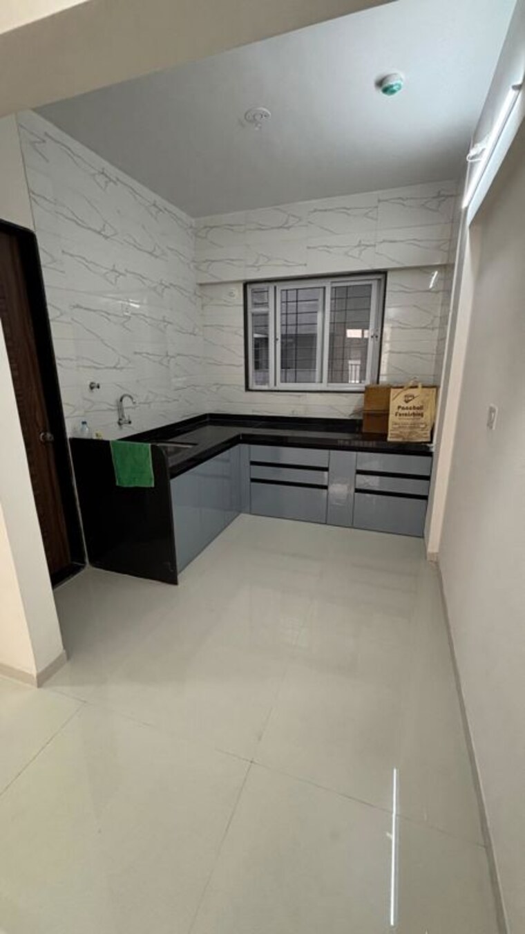 Kitchen, veddant-ganesh-bella-rossa-phase-2 2 Bedroom 1006 Sq.Ft. Apartment In Punawale Pune 10672756