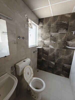 Bathroom in 2 BHK Apartment at Pivotal Riddhi Siddhi, Sector 99 – for Rent