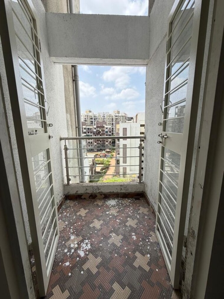 Balcony, ramesh-hermes-heritage-phase-2 2.5 Bedroom 1250 Sq.Ft. Penthouse In Shastrinagar Pune 10704167