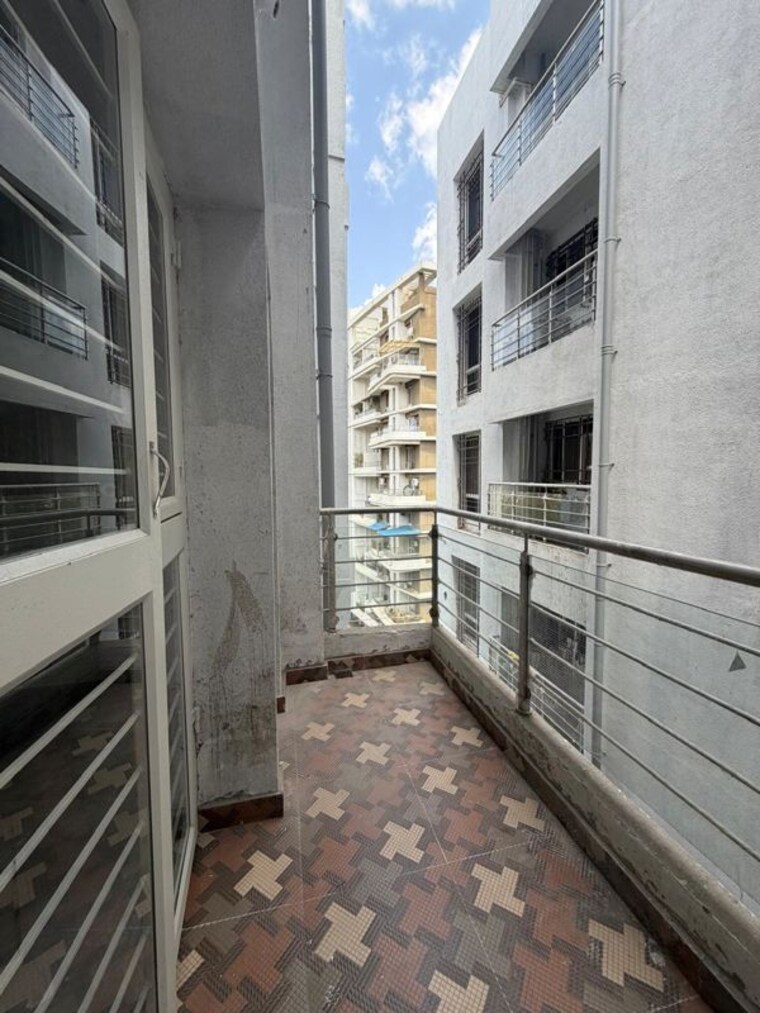 Balcony, ramesh-hermes-heritage-phase-2 2.5 Bedroom 1250 Sq.Ft. Penthouse In Shastrinagar Pune 10704167
