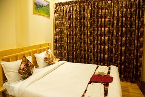 Bedroom in 2 BHK Apartment at Rangoli Smruti, Santacruz West – for Rent