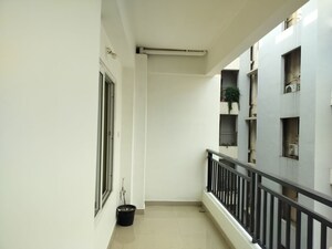 Building Lobby in 2 BHK Apartment at Paramount Grande, Sarusajai – for Rent