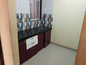Kitchen in 1 BHK Apartment at Ramdev Bhav Residency, Kalher – for Sale