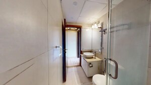 Bathroom in 3 BHK Apartment at Bhartiya Nikoo Homes, Thanisandra Main Road – for Sale