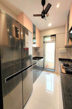 Kitchen in 2 BHK Apartment at Rustomjee Urbania Azziano, Thane West – for Rent