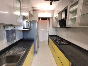 Kitchen in 2 BHK Apartment at Rustomjee Urbania Aurelia, Thane West – for Rent