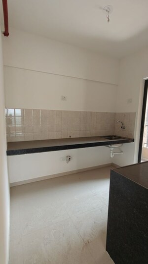 Kitchen in 2 BHK Apartment at Shapoorji Pallonji Joyville Hadapsar Annexe, Hadapsar – for Sale