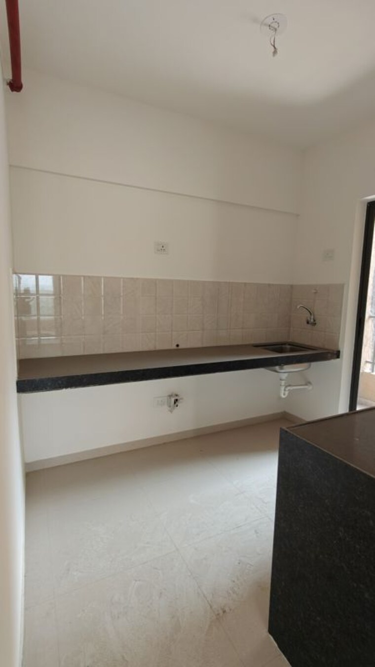 Kitchen, shapoorji-pallonji-joyville-hadapsar-annexe 2 Bedroom 726 Sq.Ft. Apartment In Hadapsar Pune 10704387