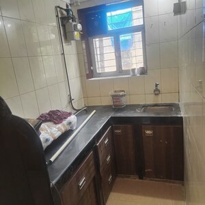 Kitchen in 1 BHK Apartment at Adarsh Nagar Society, Worli – for Rent