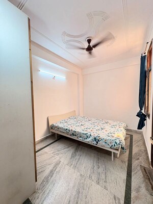 Bedroom in 2 BHK Builder Floor at Chattarpur – for Rent