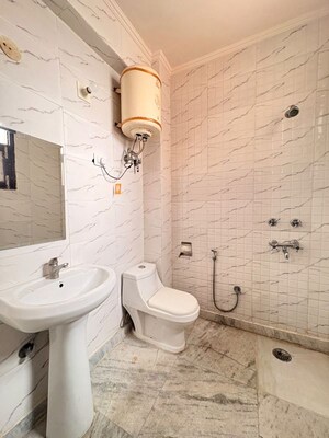 Bathroom in 2 BHK Builder Floor at Chattarpur – for Rent