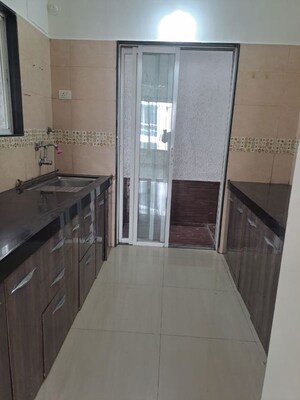 Kitchen in 2 BHK Apartment at Pharande Celestial City, Ravet – for Rent