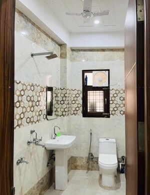 Bathroom in 2 BHK Builder Floor at Ramesh Nagar – for Rent